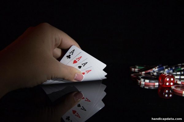让球盘平台深度解析：推牌九中的心理暗示如何成为博弈胜负手